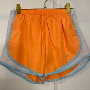 Orange Nike shorts